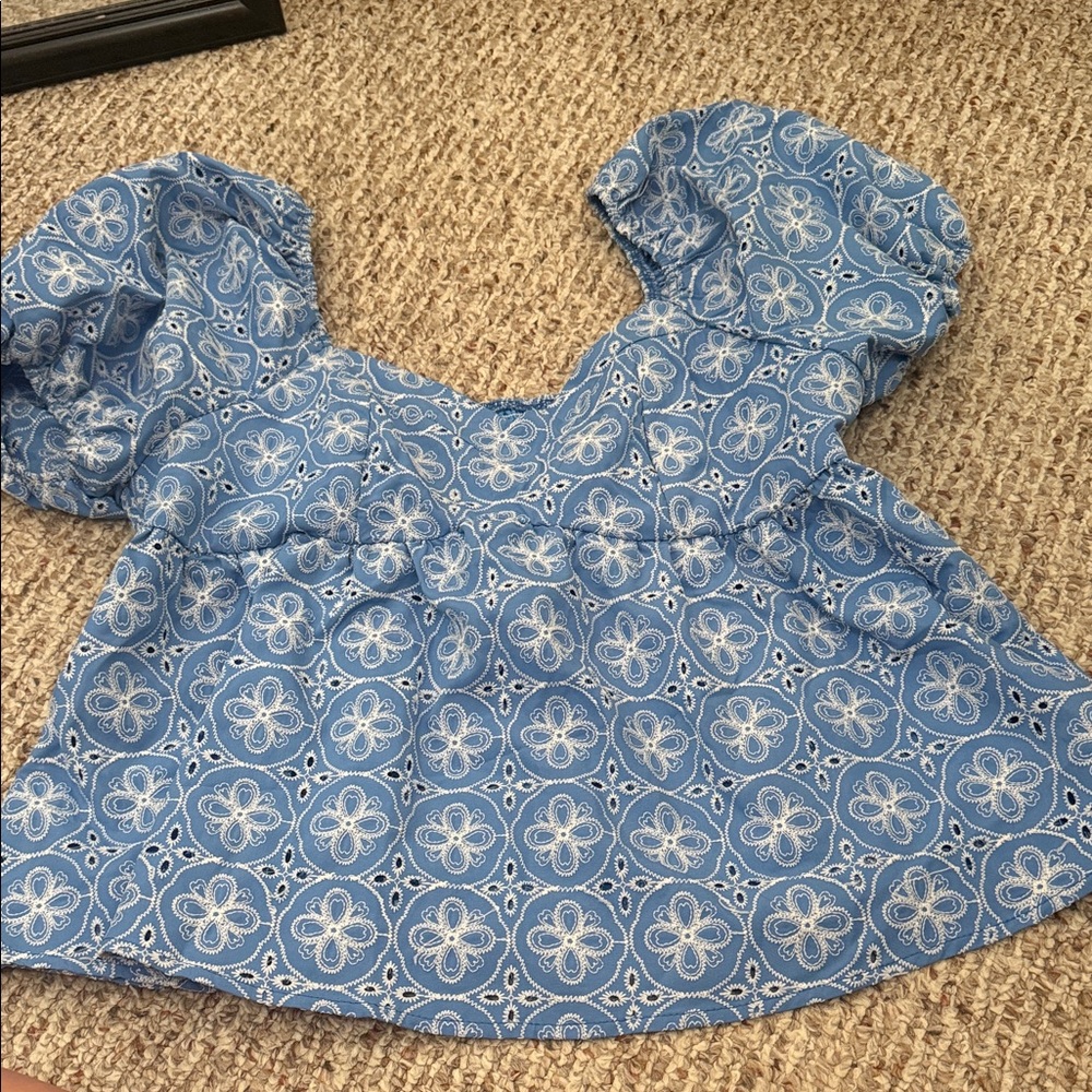 Women’s blue top